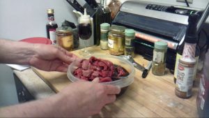 Making the Jalapeno Roulette Beef Jerky recipe.