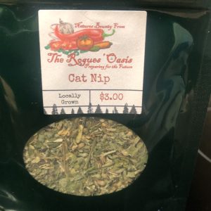 Locally grown catnip from The Rogues' Oasis, packaged in a dark green bag with a rustic label.