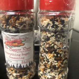 The Rogues' Oasis Everything Bagel Seasoning in red-capped jars, featuring a vibrant mix of sesame seeds and spices.