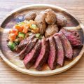 Nice healthy meal rare steal for lovers with salad and baked potatoes.