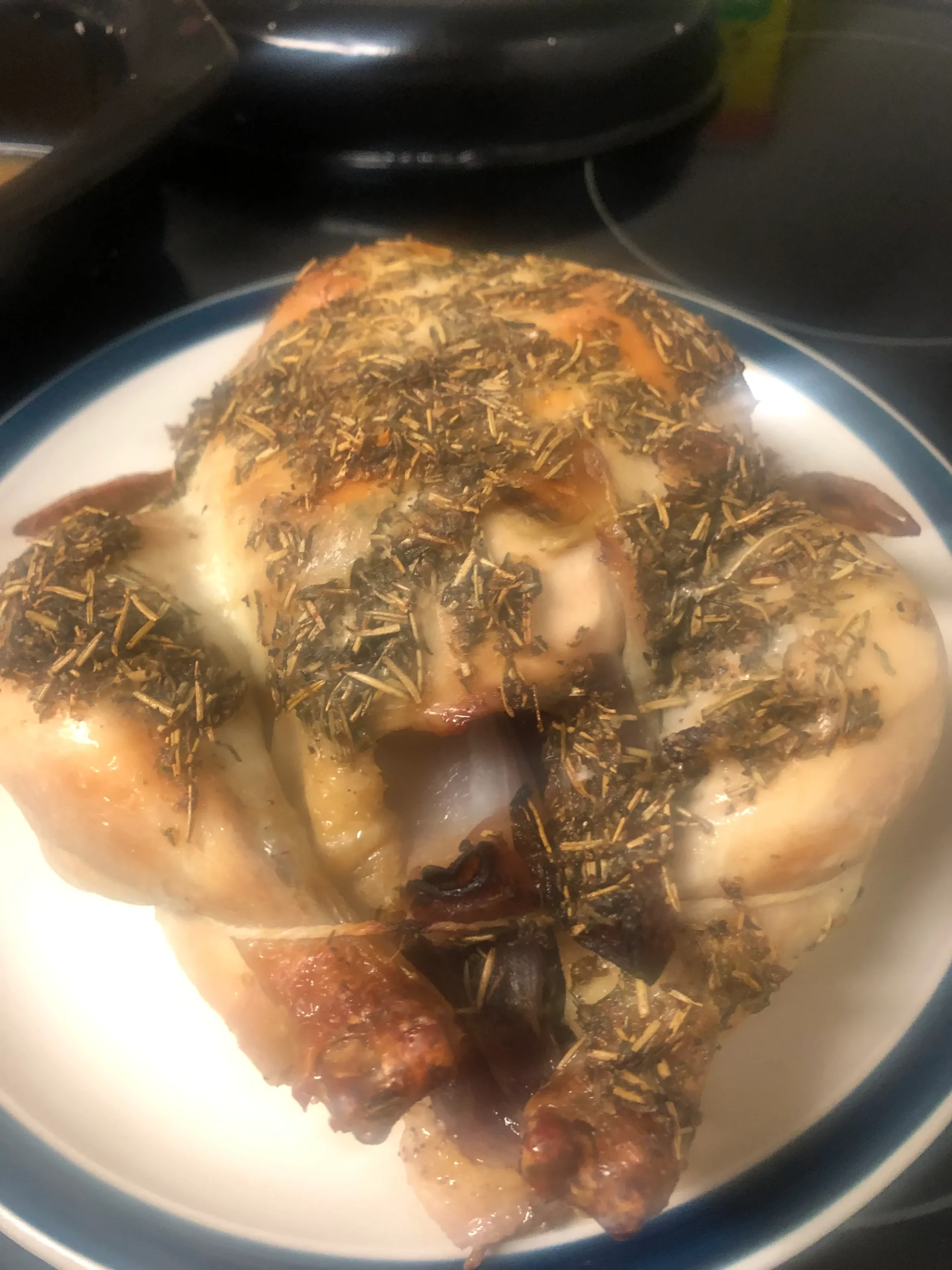 A succulent roast chicken with a golden-brown crust and herbal tallow rub.